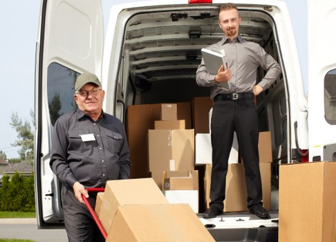 Removal van loading recyclable household items in Islington