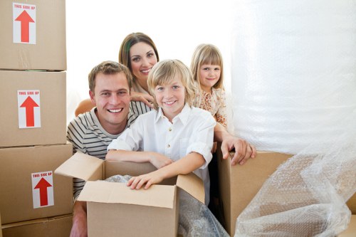 Team handling office relocation logistics in a busy Islington street