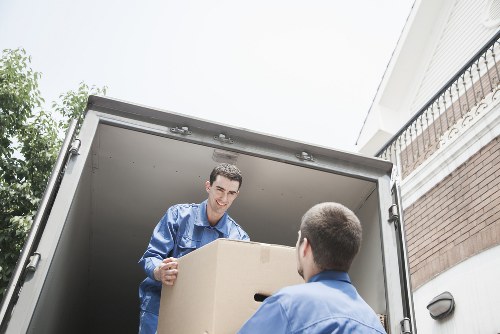Packed boxes and furniture ready for a local home removal
